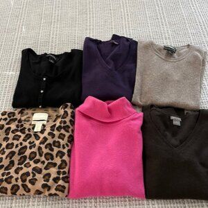 Cashmere sweaters and one holiday sweater